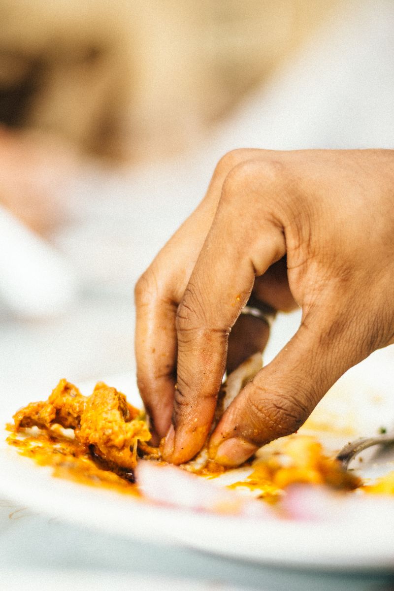 eating with hands - tonkin legends vietnam dmc