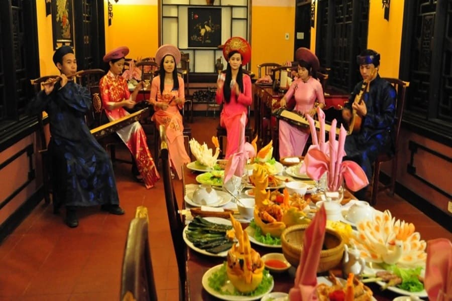 royal meal of hue in vietnamese culinary at the table - vietnam art & culture journey