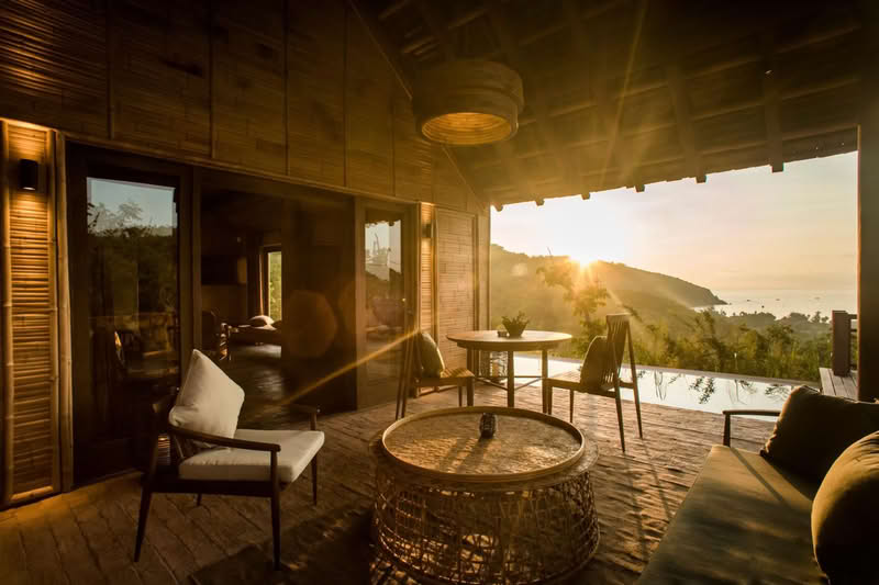 Luxury hillside villa terrace at sunset curated by Tonkin Legends