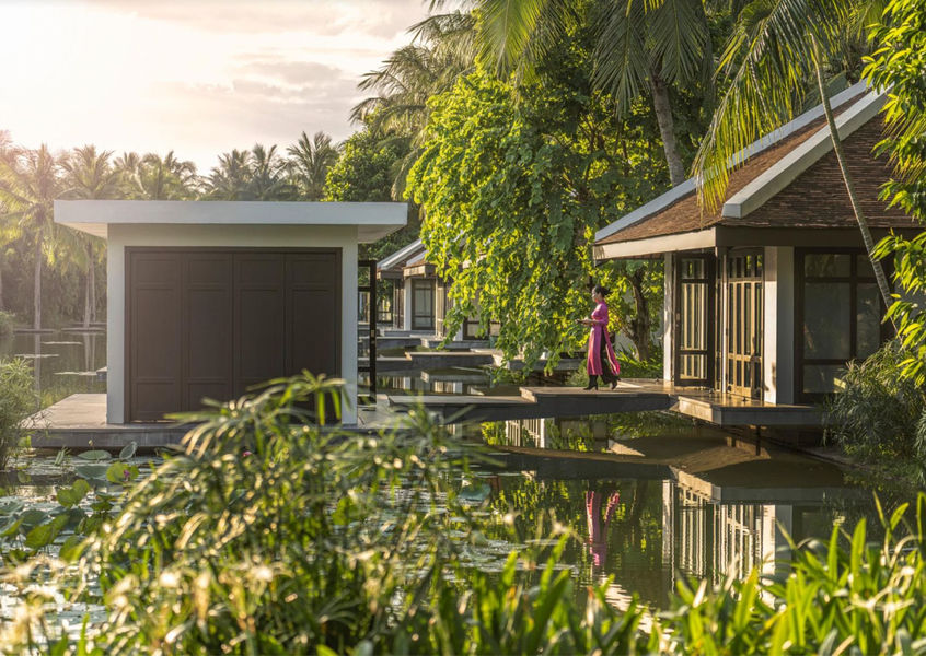 Four Seasons Nam Hai Hoi An villa and lotus pond at golden hour