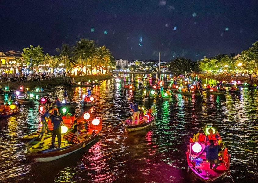 Colorful lantern boats on Thu Bon River at Hoi An night festival