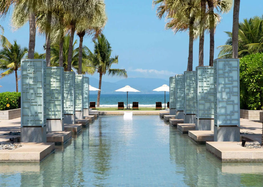 Reflecting pool walkway leading to beach at Hyatt Regency