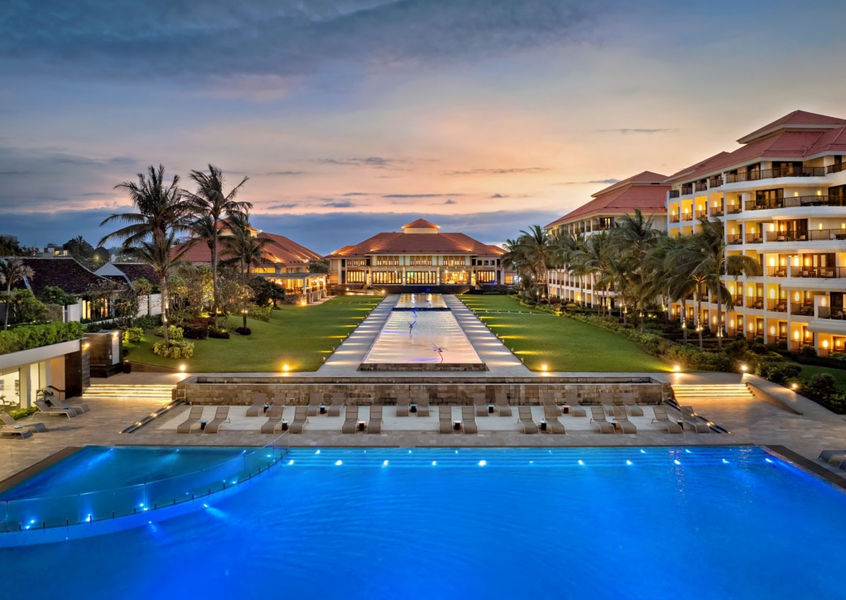 Twilight view of Pullman Danang Beach Resort pool