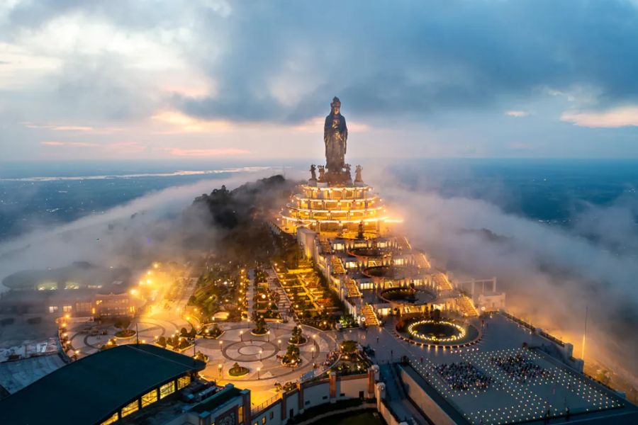 Ba Den Mountain Buddha statue at sunset, Tay Ninh